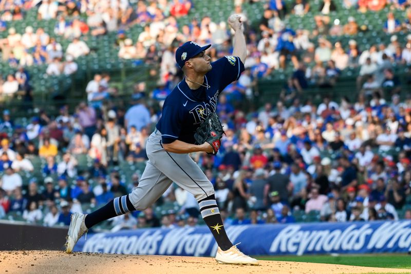 May 30, 2023; Chicago, Illinois, USA; Tampa Bay Rays starting pitcher Shane McClanahan (18) delivers against the Chicago Cubs during the first inning  at Wrigley Field. Mandatory Credit: Matt Marton-USA TODAY Sports