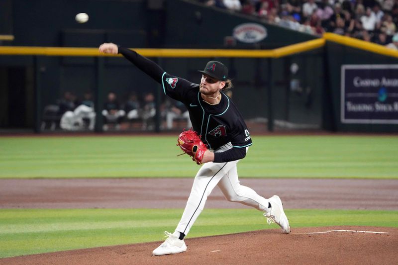 Jul 12, 2024; Phoenix, Arizona, USA; Arizona Diamondbacks pitcher Ryne Nelson (19) pitches against the Toronto Blue Jays during the first inning at Chase Field. Mandatory Credit: Joe Camporeale-USA TODAY Sports