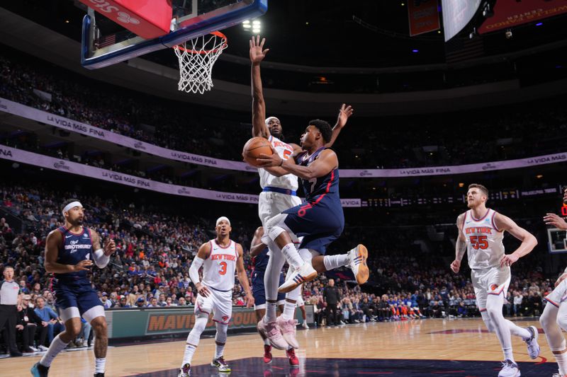 PHILADELPHIA, PA - FEBRUARY 22: Kyle Lowry #7 of the Philadelphia 76ers drives to the basket during the game against the New York Knicks on February 22, 2024 at the Wells Fargo Center in Philadelphia, Pennsylvania NOTE TO USER: User expressly acknowledges and agrees that, by downloading and/or using this Photograph, user is consenting to the terms and conditions of the Getty Images License Agreement. Mandatory Copyright Notice: Copyright 2024 NBAE (Photo by Jesse D. Garrabrant/NBAE via Getty Images)