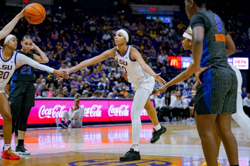 Feb 4, 2024; Baton Rouge, Louisiana, USA; LSU Lady Tigers forward Angel Reese (10) slaps hands with LSU Lady Tigers guard Janae Kent (20) and guard Aneesah Morrow (24) after a free throw against the Florida Gators during the second half at Pete Maravich Assembly Center. Mandatory Credit: Matthew Hinton-USA TODAY Sports