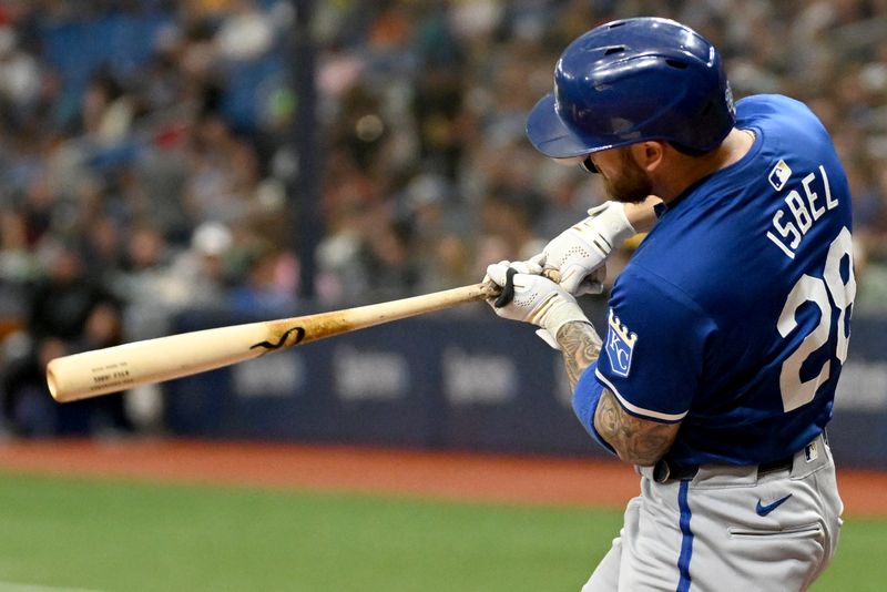 May 25, 2024; St. Petersburg, Florida, USA; Kansas City Royals center fielder Kyle Isbel (28) gets hit in the face by a foul tip in the seventh inning against the Tampa Bay Rays at Tropicana Field. Mandatory Credit: Jonathan Dyer-USA TODAY Sports