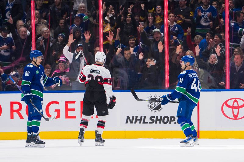 Jan 2, 2024; Vancouver, British Columbia, CAN; Ottawa Senators forward Claude Giroux (28) watches as Vancouver Canucks forward Andrei Kuzmenko (96) and forward Elias Pettersson (40) celebrate Pettersson   s second goal of the game in the first period at Rogers Arena. Mandatory Credit: Bob Frid-USA TODAY Sports