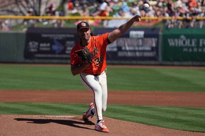 Feb 27, 2026; Scottsdale, Arizona, USA; San Francisco Giants pitcher Robbie Ray (38) throws against the Los Angeles Dodgers in the first inning at Scottsdale Stadium. Mandatory Credit: Rick Scuteri-Imagn Images