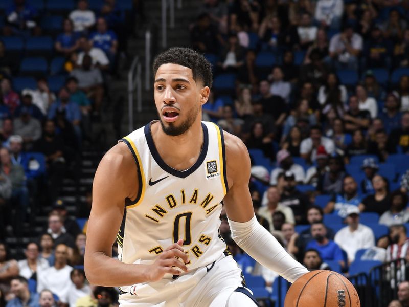 ORLANDO, FL - NOVEMBER 13: Tyrese Haliburton #0 of the Indiana Pacers dribbles the ball during the game against the Orlando Magic on November 13, 2024 at Kia Center in Orlando, Florida. NOTE TO USER: User expressly acknowledges and agrees that, by downloading and or using this photograph, User is consenting to the terms and conditions of the Getty Images License Agreement. Mandatory Copyright Notice: Copyright 2024 NBAE (Photo by Fernando Medina/NBAE via Getty Images)