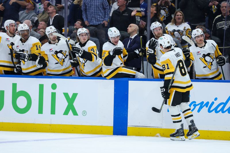 Dec 4, 2025; Tampa, Florida, USA; Pittsburgh Penguins center Ben Kindel (81) celebrates after scoring a goal against the Tampa Bay Lightning in the first period at Benchmark International Arena. Mandatory Credit: Nathan Ray Seebeck-Imagn Images