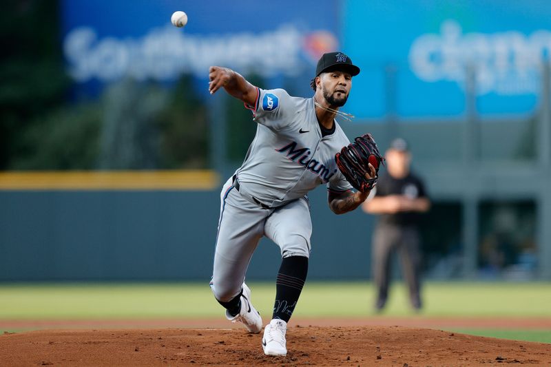 Aug 27, 2024; Denver, Colorado, USA; Miami Marlins starting pitcher Roddery Munoz (71) pitches in the first inning against the Colorado Rockies at Coors Field. Mandatory Credit: Isaiah J. Downing-USA TODAY Sports