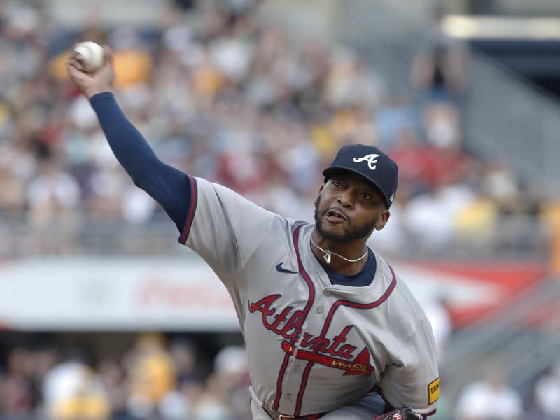 May 24, 2024; Pittsburgh, Pennsylvania, USA;  Atlanta Braves relief pitcher Darius Vines (61) pitches against the Pittsburgh Pirates during the fifth inning at PNC Park. Mandatory Credit: Charles LeClaire-USA TODAY Sports