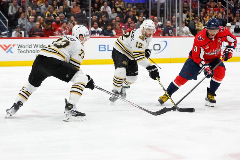 Apr 15, 2024; Washington, District of Columbia, USA; Washington Capitals left wing Alex Ovechkin (8) battles for the puck with Boston Bruins defenseman Kevin Shattenkirk (12) and Bruins defenseman Charlie McAvoy (73) in the third period at Capital One Arena. Mandatory Credit: Geoff Burke-USA TODAY Sports