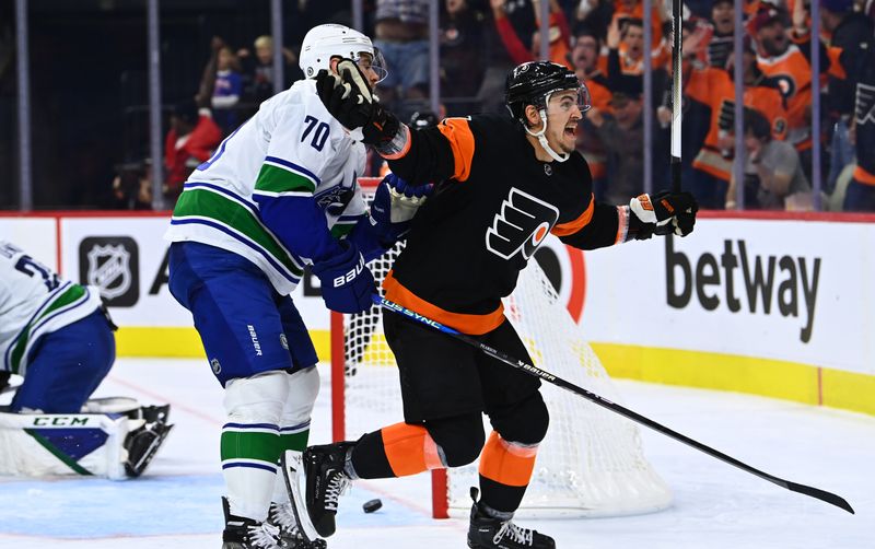 Oct 15, 2022; Philadelphia, Pennsylvania, USA; Philadelphia Flyers right wing Travis Konecny (11) celebrates after scoring a goal against the Vancouver Canucks in the third period at Wells Fargo Center. Mandatory Credit: Kyle Ross-USA TODAY Sports