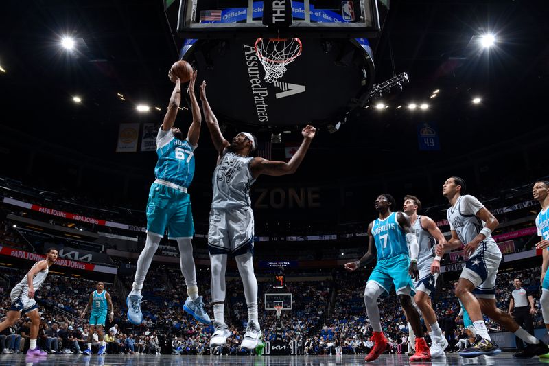 ORLANDO, FL - FEBRUARY 12: Taj Gibson #67 of the Charlotte Hornets drives to the basket during the game against the Orlando Magic on February 12, 2025 at Kia Center in Orlando, Florida. NOTE TO USER: User expressly acknowledges and agrees that, by downloading and or using this photograph, User is consenting to the terms and conditions of the Getty Images License Agreement. Mandatory Copyright Notice: Copyright 2025 NBAE (Photo by Fernando Medina/NBAE via Getty Images)