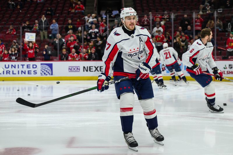 Dec 10, 2023; Chicago, Illinois, USA; Washington Capitals right wing T.J. Oshie (77) warms up against the Chicago Blackhawks before the game at the United Center. Mandatory Credit: Daniel Bartel-USA TODAY Sports