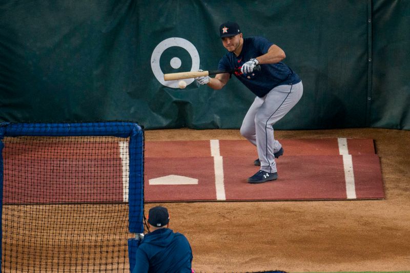 Oct 19, 2023; Arlington, Texas, USA; Houston Astros catcher Yainer Diaz (21) takes batting practice before the game against the Texas Rangers in game four of the ALCS for the 2023 MLB playoffs at Globe Life Field. Mandatory Credit: Jerome Miron-USA TODAY Sports