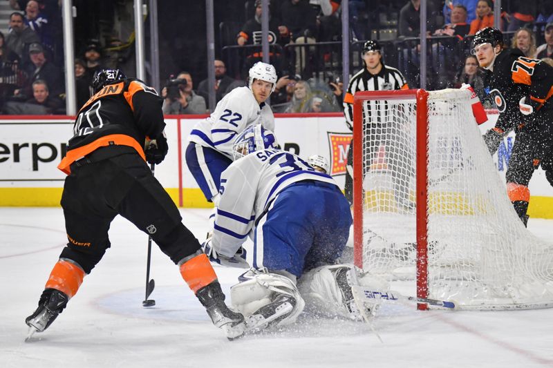 Mar 19, 2024; Philadelphia, Pennsylvania, USA; Philadelphia Flyers center Scott Laughton (21) scores a goal against Toronto Maple Leafs goaltender Ilya Samsonov (35) during the third period at Wells Fargo Center. Mandatory Credit: Eric Hartline-USA TODAY Sports