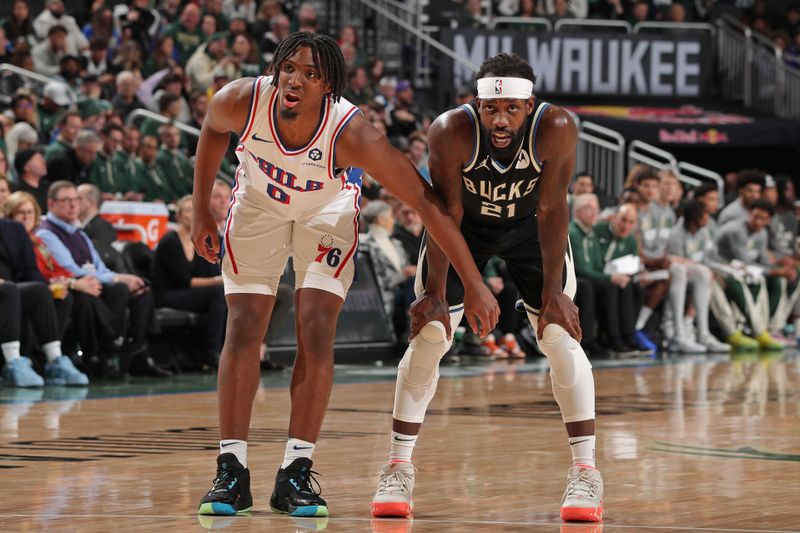 MILWAUKEE, WI - MARCH 14: Tyrese Maxey #0 of the Philadelphia 76ers and Patrick Beverley #21 of the Milwaukee Bucks look on during the game on March 14, 2024 at the Fiserv Forum Center in Milwaukee, Wisconsin. NOTE TO USER: User expressly acknowledges and agrees that, by downloading and or using this Photograph, user is consenting to the terms and conditions of the Getty Images License Agreement. Mandatory Copyright Notice: Copyright 2024 NBAE (Photo by Gary Dineen/NBAE via Getty Images).