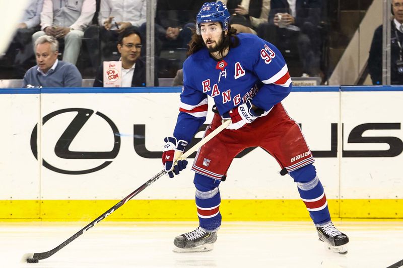 Apr 15, 2024; New York, New York, USA;  New York Rangers center Mika Zibanejad (93) looks to make a pass in the first period against the Ottawa Senators at Madison Square Garden. Mandatory Credit: Wendell Cruz-USA TODAY Sports