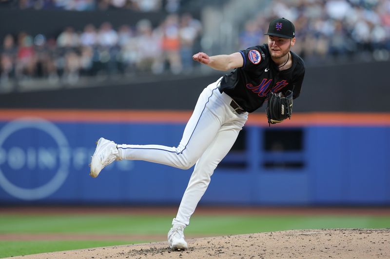 May 24, 2024; New York City, New York, USA; New York Mets starting pitcher Christian Scott (45) follows through on a pitch against the San Francisco Giants during the second inning at Citi Field. Mandatory Credit: Brad Penner-USA TODAY Sports