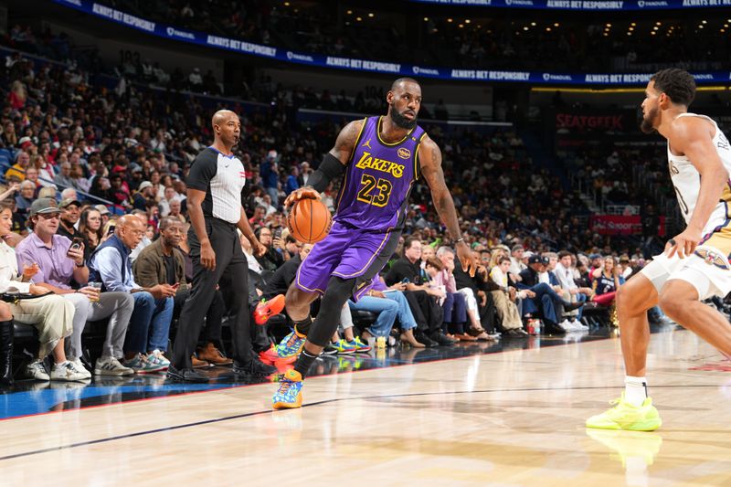 NEW ORLEANS, LA - NOVEMBER 16: LeBron James #23 of the Los Angeles Lakers dribbles the ball during the game against the New Orleans Pelicans on November 16, 2024 at the Smoothie King Center in New Orleans, Louisiana. NOTE TO USER: User expressly acknowledges and agrees that, by downloading and or using this Photograph, user is consenting to the terms and conditions of the Getty Images License Agreement. Mandatory Copyright Notice: Copyright 2024 NBAE (Photo by Jesse D. Garrabrant/NBAE via Getty Images)