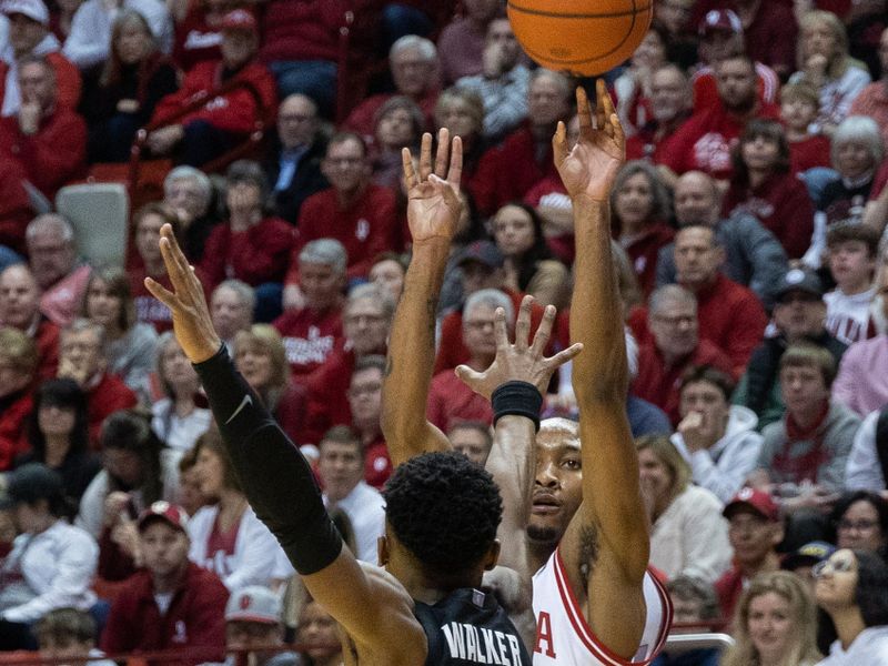 Jan 22, 2023; Bloomington, Indiana, USA; Indiana Hoosiers guard Tamar Bates (53) shoots the ball while Michigan State Spartans guard Tyson Walker (2) defends in the first half at Simon Skjodt Assembly Hall. Mandatory Credit: Trevor Ruszkowski-USA TODAY Sports