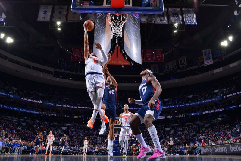 PHILADELPHIA, PA - FEBRUARY 22: Jalen Brunson #11 of the New York Knicks drives to the basket during the game against the Philadelphia 76ers on February 22, 2024 at the Wells Fargo Center in Philadelphia, Pennsylvania NOTE TO USER: User expressly acknowledges and agrees that, by downloading and/or using this Photograph, user is consenting to the terms and conditions of the Getty Images License Agreement. Mandatory Copyright Notice: Copyright 2024 NBAE (Photo by Jesse D. Garrabrant/NBAE via Getty Images)