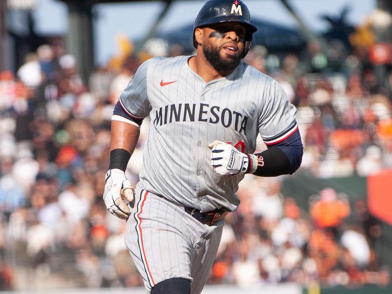 Jul 13, 2024; San Francisco, California, USA; Minnesota Twins first base Carlos Santana (30) rounds the bases after hitting a home run during the sixth inning of the game against the San Francisco Giants at Oracle Park. Mandatory Credit: Ed Szczepanski-USA TODAY Sports