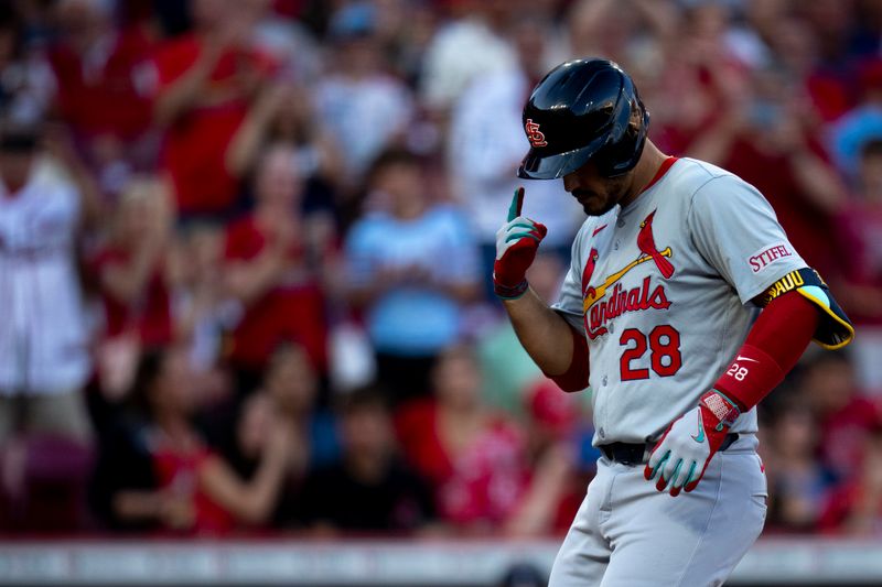 May 28, 2024; Cincinnati, Ohio, USA; St. Louis Cardinals third baseman Nolan Arenado (28) crosses home plate after hitting a 2-run home run in the fourth inning at Great American Ball Park. Mandatory Credit: Albert Cesare-USA TODAY Sports