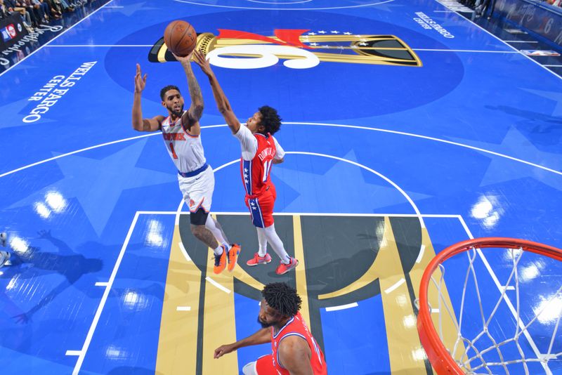 PHILADELPHIA, PA - NOVEMBER 12: Cameron Payne #1 of the New York Knicks shoots the ball during the game against the Philadelphia 76ers during the Emirates NBA Cup game on November 12, 2024 at the Wells Fargo Center in Philadelphia, Pennsylvania NOTE TO USER: User expressly acknowledges and agrees that, by downloading and/or using this Photograph, user is consenting to the terms and conditions of the Getty Images License Agreement. Mandatory Copyright Notice: Copyright 2024 NBAE (Photo by Jesse D. Garrabrant/NBAE via Getty Images)