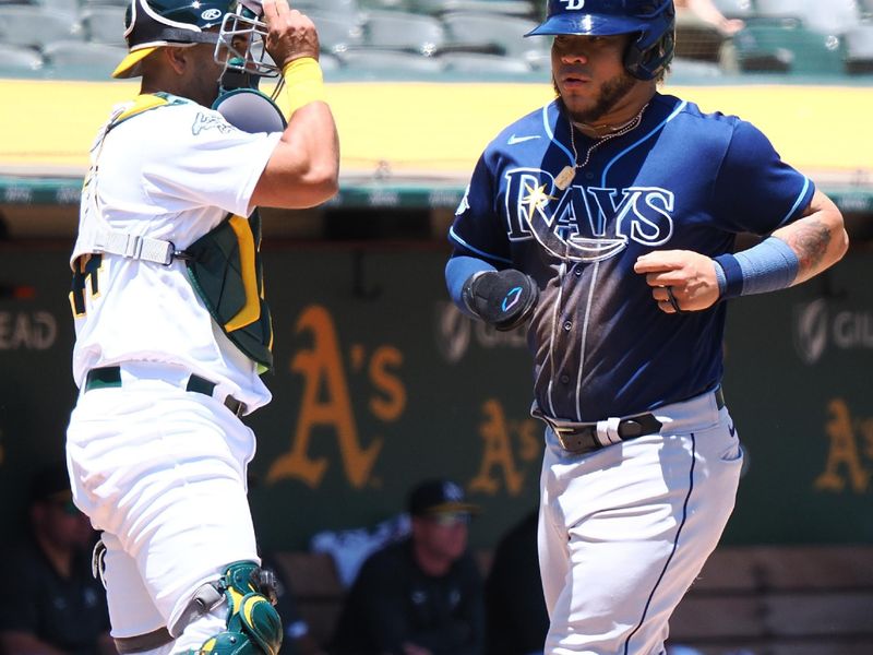 Jun 15, 2023; Oakland, California, USA; Tampa Bay Rays designated hitter Harold Ramirez (43) scores a run against the Oakland Athletics during the second inning at Oakland-Alameda County Coliseum. Mandatory Credit: Kelley L Cox-USA TODAY Sports