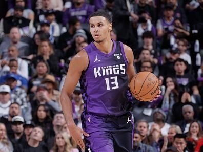 SACRAMENTO, CA - DECEMBER 23: Keegan Murray #13 of the Sacramento Kings brings the ball up court against the Minnesota Timberwolves on December 23, 2023 at Golden 1 Center in Sacramento, California. NOTE TO USER: User expressly acknowledges and agrees that, by downloading and or using this Photograph, user is consenting to the terms and conditions of the Getty Images License Agreement. Mandatory Copyright Notice: Copyright 2023 NBAE (Photo by Rocky Widner/NBAE via Getty Images)