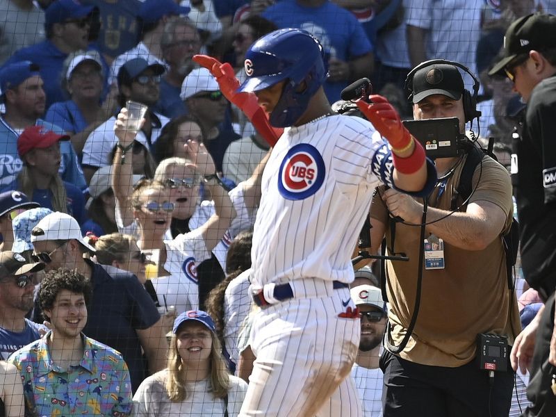 Aug 20, 2023; Chicago, Illinois, USA; Chicago Cubs catcher Miguel Amaya (6) points after hitting a home run against the Kansas City Royals during the eighth inning at Wrigley Field. Mandatory Credit: Matt Marton-USA TODAY Sports