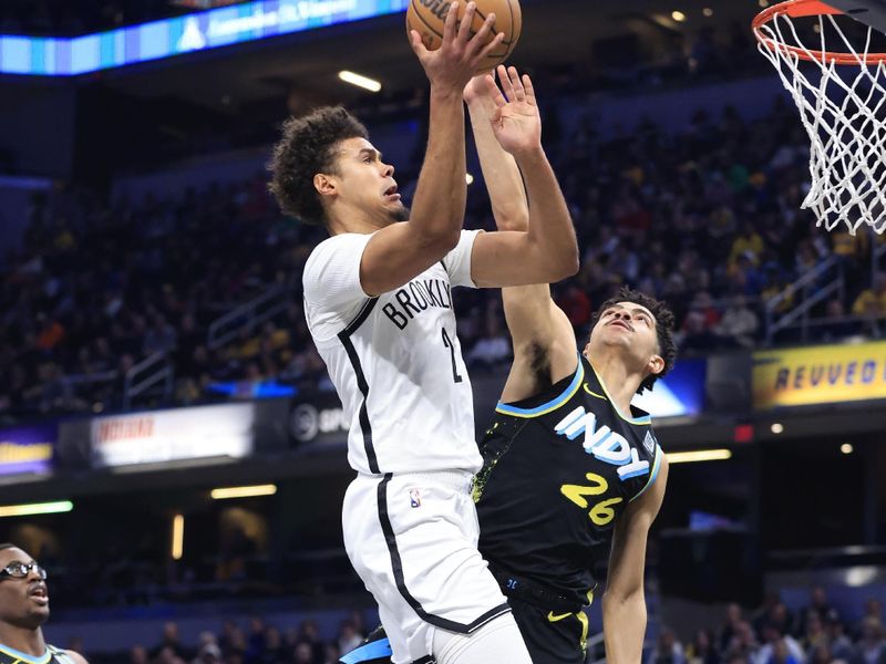 INDIANAPOLIS, INDIANA - MARCH 16: Cameron Johnson #2 of the Brooklyn Nets takes a shot over Ben Sheppard #26 of the Indiana Pacers during the first half at Gainbridge Fieldhouse on March 16, 2024 in Indianapolis, Indiana. NOTE TO USER: User expressly acknowledges and agrees that, by downloading and or using this photograph, User is consenting to the terms and conditions of the Getty Images License Agreement. (Photo by Justin Casterline/Getty Images)