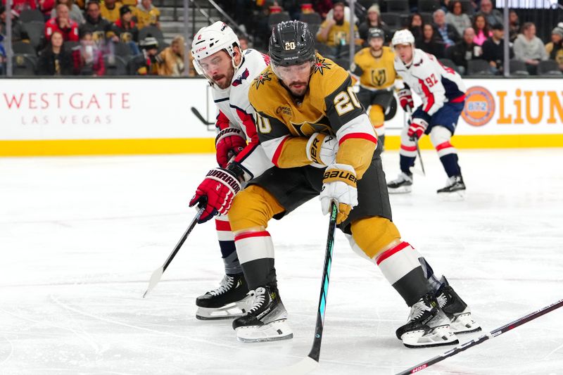 Dec 2, 2023; Las Vegas, Nevada, USA; Vegas Golden Knights center Chandler Stephenson (20) skates against Washington Capitals defenseman Joel Edmundson (6) during the second period at T-Mobile Arena. Mandatory Credit: Stephen R. Sylvanie-USA TODAY Sports