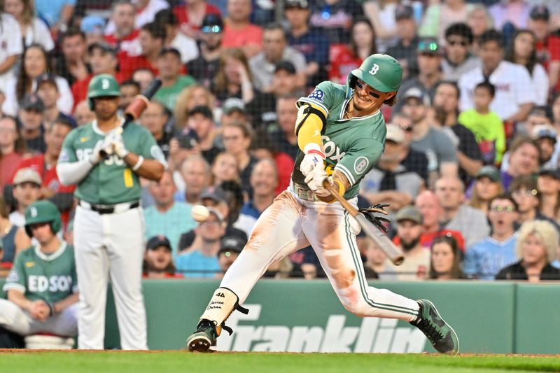 May 16, 2025; Boston, Massachusetts, USA; Boston Red Sox left fielder Jarren Duran (16) hits a triple against the Atlanta Braves during the third inning at Fenway Park. Mandatory Credit: Eric Canha-Imagn Images