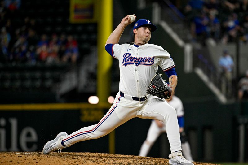 Apr 23, 2024; Arlington, Texas, USA; Texas Rangers starting pitcher Cole Winn (60) pitches in relief against the Seattle Mariners during the game at Globe Life Field. Mandatory Credit: Jerome Miron-USA TODAY Sports