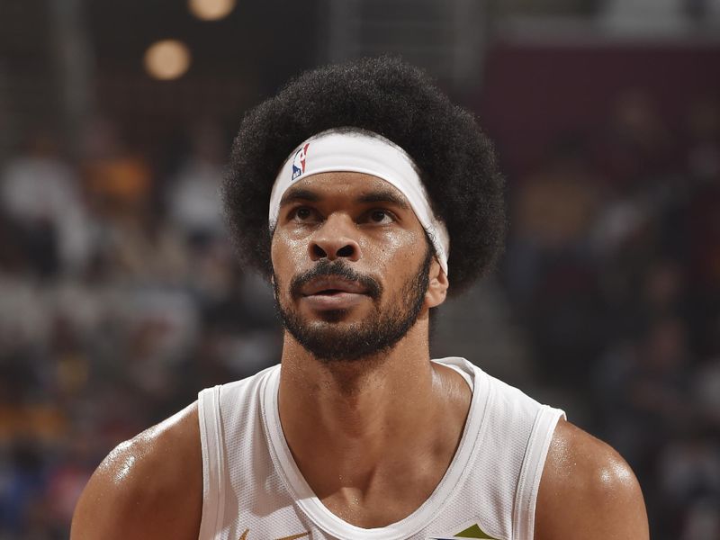 CLEVELAND, OH - OCTOBER 25: Jarrett Allen #31 of the Cleveland Cavaliers shoots a free throw during the game against the Detroit Pistons on October 25, 2024 at Rocket Mortgage FieldHouse in Cleveland, Ohio. NOTE TO USER: User expressly acknowledges and agrees that, by downloading and/or using this Photograph, user is consenting to the terms and conditions of the Getty Images License Agreement. Mandatory Copyright Notice: Copyright 2024 NBAE (Photo by David Liam Kyle/NBAE via Getty Images)