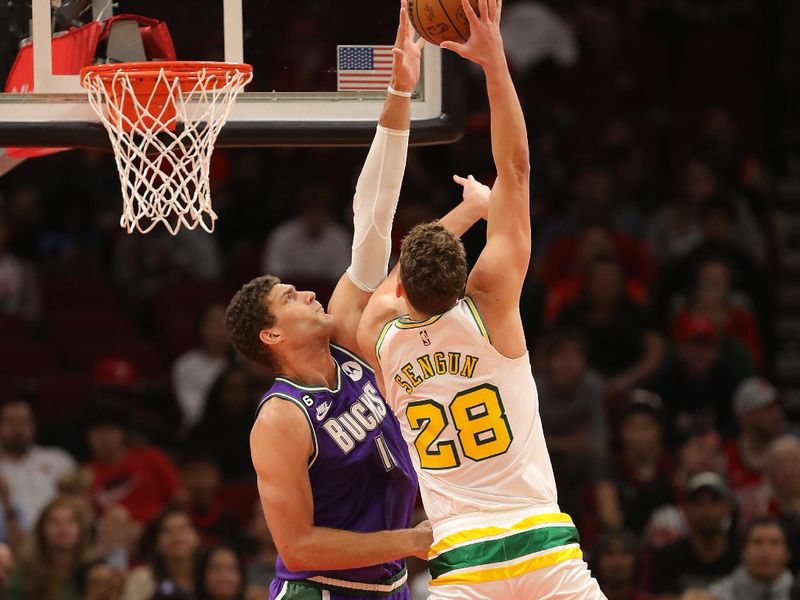 HOUSTON, TEXAS - DECEMBER 11: Alperen Sengun #28 of the Houston Rockets shoots over Brook Lopez #11 of the Milwaukee Bucks during the first quarter at Toyota Center on December 11, 2022 in Houston, Texas. NOTE TO USER: User expressly acknowledges and agrees that, by downloading and or using this photograph, User is consenting to the terms and conditions of the Getty Images License Agreement. (Photo by Bob Levey/Getty Images)