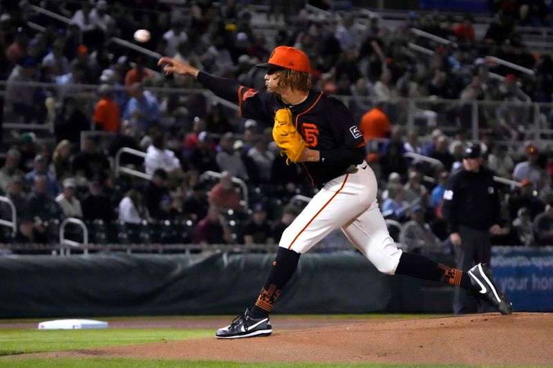 Mar 19, 2024; Scottsdale, Arizona, USA; San Francisco Giants pitcher Spencer Bivens throws against the Kansas City Royals (94) in the first inning at Scottsdale Stadium. Mandatory Credit: Rick Scuteri-USA TODAY Sports