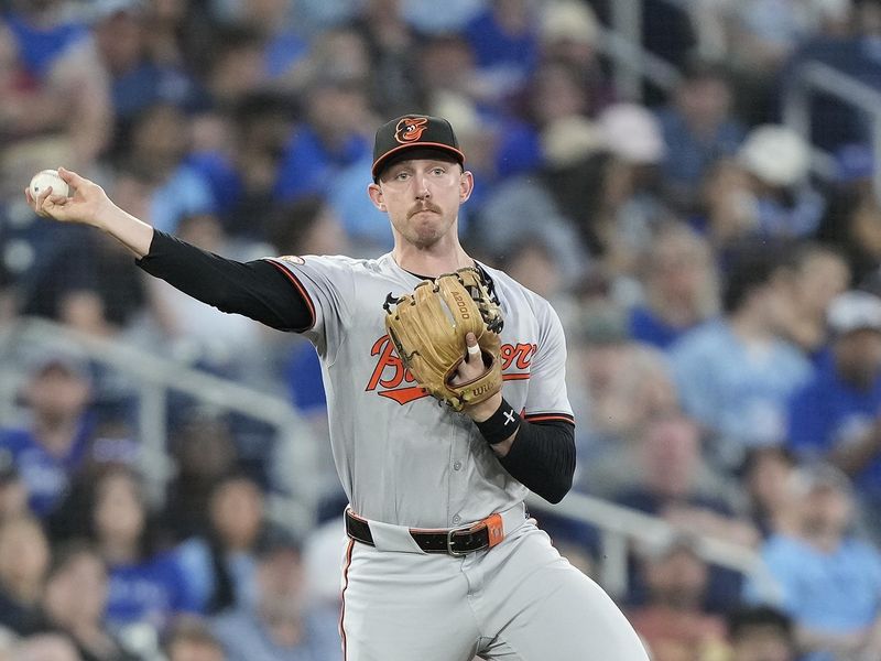 Jun 4, 2024; Toronto, Ontario, CAN; Baltimore Orioles third baseman Jordan Westburg (11) throws out Toronto Blue Jays catcher Danny Jansen (not pictured) at first base during the sixth inning at Rogers Centre. Mandatory Credit: John E. Sokolowski-USA TODAY Sports