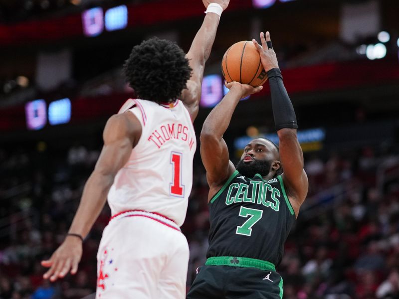 HOUSTON, TEXAS - JANUARY 21: Jaylen Brown #7 of the Boston Celtics shoots over Amen Thompson #1 of the Houston Rockets during the second quarter of the game at Toyota Center on January 21, 2024 in Houston, Texas. NOTE TO USER: User expressly acknowledges and agrees that, by downloading and or using this photograph, User is consenting to the terms and conditions of the Getty Images License Agreement. (Photo by Alex Bierens de Haan/Getty Images)