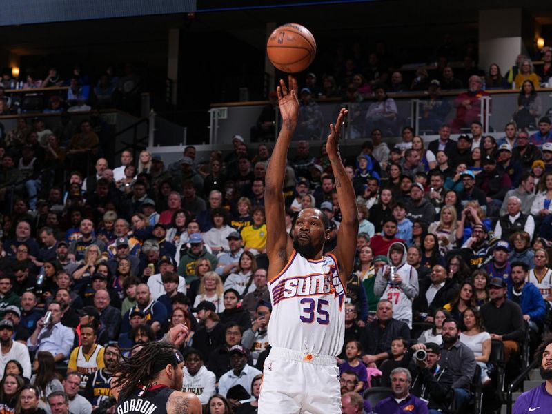 DENVER, CO - MARCH 27: Kevin Durant #35 of the Phoenix Suns shoots a 3-point basket during the game  on March 27, 2024 at the Ball Arena in Denver, Colorado. NOTE TO USER: User expressly acknowledges and agrees that, by downloading and/or using this Photograph, user is consenting to the terms and conditions of the Getty Images License Agreement. Mandatory Copyright Notice: Copyright 2024 NBAE (Photo by Bart Young/NBAE via Getty Images)