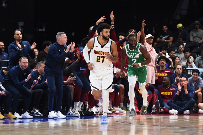 ABU DHABI, UAE - OCTOBER 6: Jamal Murray #27 of the Denver Nuggets celebrates during the game against the Boston Celtics during the 2024 Global Games on October 6, 2024 at the Etihad Arena in Abu Dhabi, United Arab Emirates. NOTE TO USER: User expressly acknowledges and agrees that, by downloading and/or using this Photograph, user is consenting to the terms and conditions of the Getty Images License Agreement. Mandatory Copyright Notice: Copyright 2024 NBAE (Photo by Brian Babineau/NBAE via Getty Images)