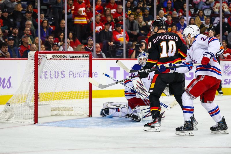 Nov 21, 2024; Calgary, Alberta, CAN; Calgary Flames center Yegor Sharangovich (not pictured) scores a goal against New York Rangers goaltender Igor Shesterkin (31) during the second period at Scotiabank Saddledome. Mandatory Credit: Sergei Belski-Imagn Images