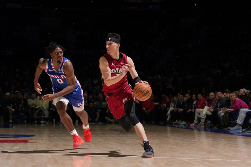 PHILADELPHIA, PA - FEBRUARY 14: Tyler Herro #14 of the Miami Heat dribbles the ball during the game against the Philadelphia 76ers on February 14, 2024 at the Wells Fargo Center in Philadelphia, Pennsylvania NOTE TO USER: User expressly acknowledges and agrees that, by downloading and/or using this Photograph, user is consenting to the terms and conditions of the Getty Images License Agreement. Mandatory Copyright Notice: Copyright 2024 NBAE (Photo by Jesse D. Garrabrant/NBAE via Getty Images)