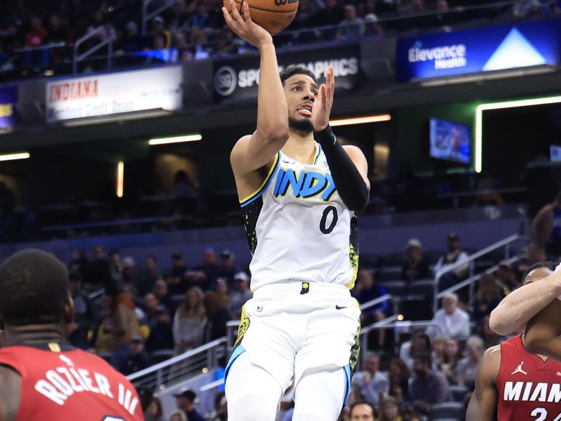 INDIANAPOLIS, INDIANA - NOVEMBER 17: Tyrese Haliburton #0 of the Indiana Pacers takes a shot against the Miami Heat during the second half at Gainbridge Fieldhouse on November 17, 2024 in Indianapolis, Indiana. NOTE TO USER: User expressly acknowledges and agrees that, by downloading and or using this photograph, User is consenting to the terms and conditions of the Getty Images License Agreement. (Photo by Justin Casterline/Getty Images)