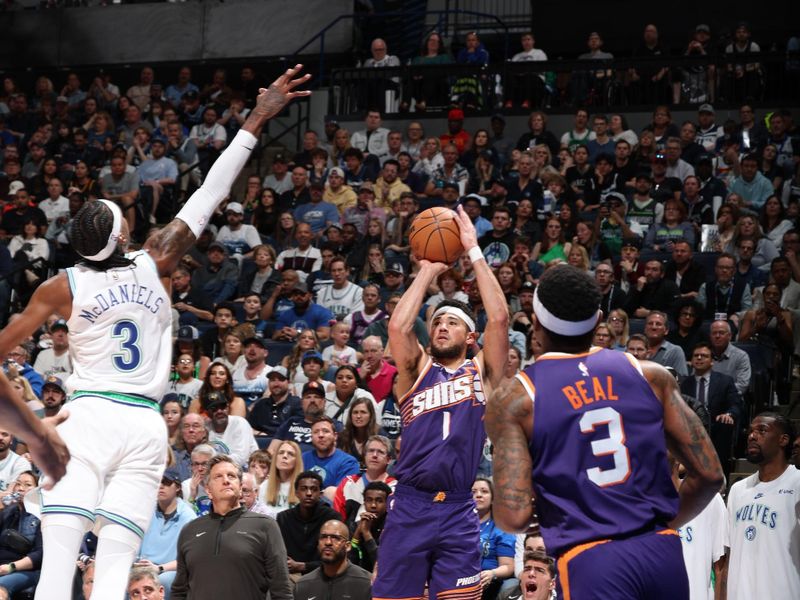 MINNEAPOLIS, MN -  APRIL 14: Devin Booker #1 of the Phoenix Suns shoots the ball during the game against the Minnesota Timberwolves on April 14, 2024 at Target Center in Minneapolis, Minnesota. NOTE TO USER: User expressly acknowledges and agrees that, by downloading and or using this Photograph, user is consenting to the terms and conditions of the Getty Images License Agreement. Mandatory Copyright Notice: Copyright 2024 NBAE (Photo by David Sherman/NBAE via Getty Images)