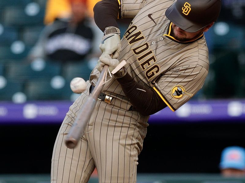 aMay 9, 2025; Denver, Colorado, USA; San Diego Padres center fielder Jackson Merrill (3) breaks his bat on a single in the first inning against the Colorado Rockies at Coors Field. Mandatory Credit: Isaiah J. Downing-Imagn Images