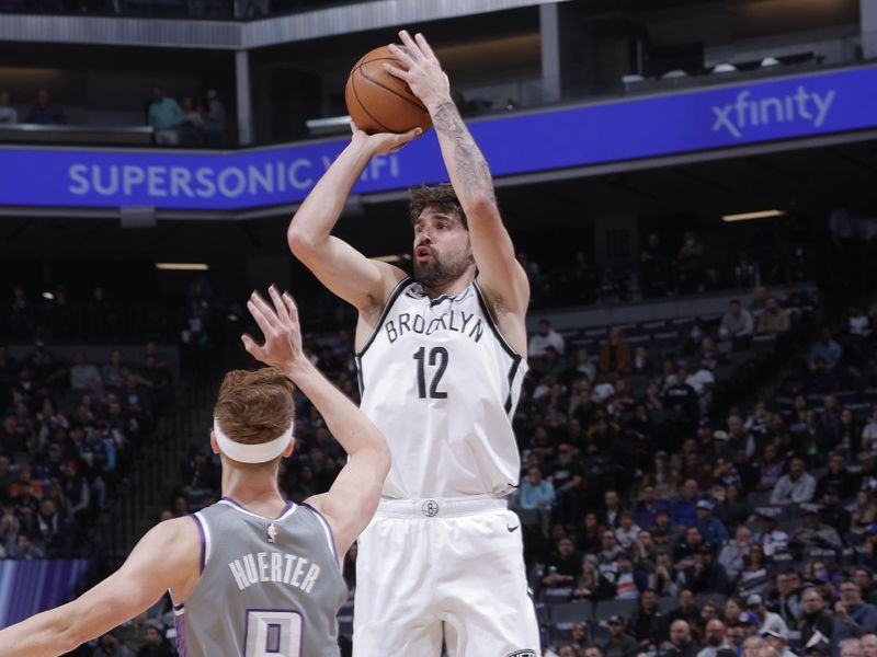 SACRAMENTO, CA - NOVEMBER 15: Joe Harris #12 of the Brooklyn Nets shoots the ball during the game against the Brooklyn Nets on November 15, 2022 at Golden 1 Center in Sacramento, California. NOTE TO USER: User expressly acknowledges and agrees that, by downloading and or using this Photograph, user is consenting to the terms and conditions of the Getty Images License Agreement. Mandatory Copyright Notice: Copyright 2022 NBAE (Photo by Rocky Widner/NBAE via Getty Images)