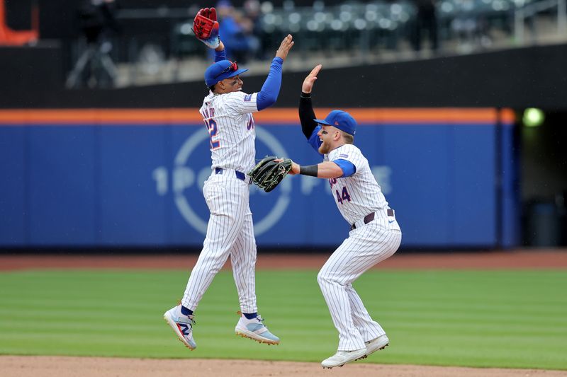 Apr 17, 2024; New York City, New York, USA; New York Mets shortstop Francisco Lindor (12) and center fielder Harrison Bader (44) celebrate after defeating the Pittsburgh Pirates at Citi Field. Mandatory Credit: Brad Penner-USA TODAY Sports