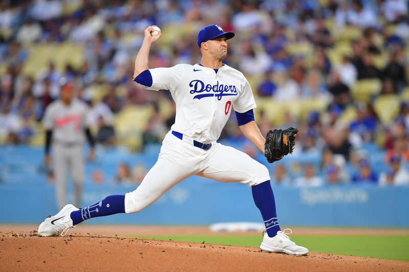 Aug 27, 2024; Los Angeles, California, USA; Los Angeles Dodgers pitcher Jack Flaherty (0) throws against the Baltimore Orioles during the first inning at Dodger Stadium. Mandatory Credit: Gary A. Vasquez-USA TODAY Sports