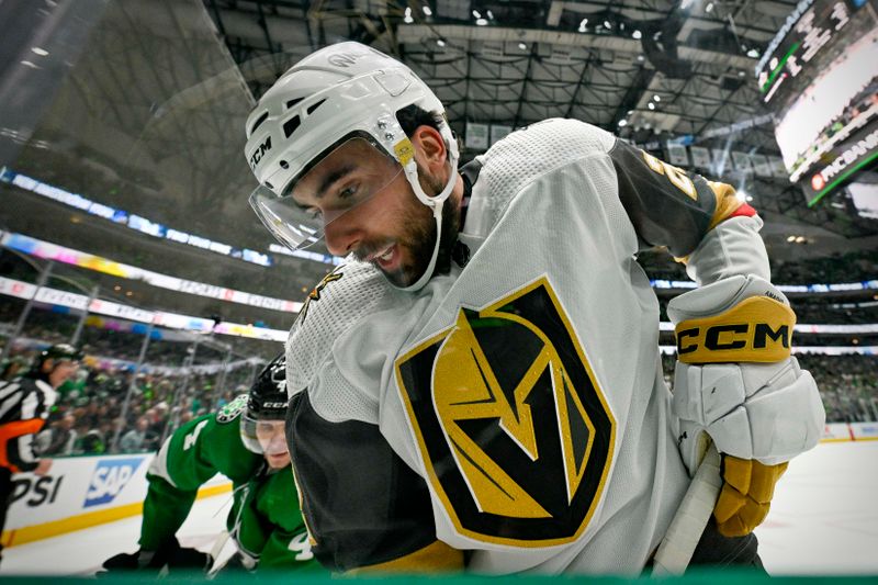 May 5, 2024; Dallas, Texas, USA; Vegas Golden Knights right wing Michael Amadio (22) looks for the puck in the Dallas Stars zone during the third period in game seven of the first round of the 2024 Stanley Cup Playoffs at American Airlines Center. Mandatory Credit: Jerome Miron-USA TODAY Sports