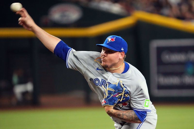 Jul 12, 2024; Phoenix, Arizona, USA; Toronto Blue Jays shortstop Leo Jiménez (49) pitches against the Arizona Diamondbacks during the first inning at Chase Field. Mandatory Credit: Joe Camporeale-USA TODAY Sports